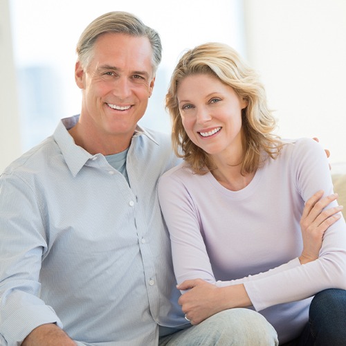 Smiling older man and woman