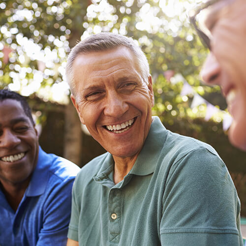 Group of friends smiling outdoors