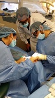 Dr. Braga Instructing a USC Periodontal Resident During Surgery