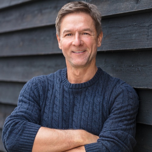 Smiling older man outdoors