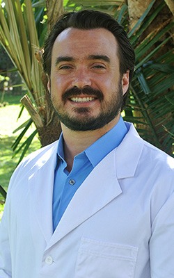 Headshot of Dr. Justin Braga ORANGE COUNTY