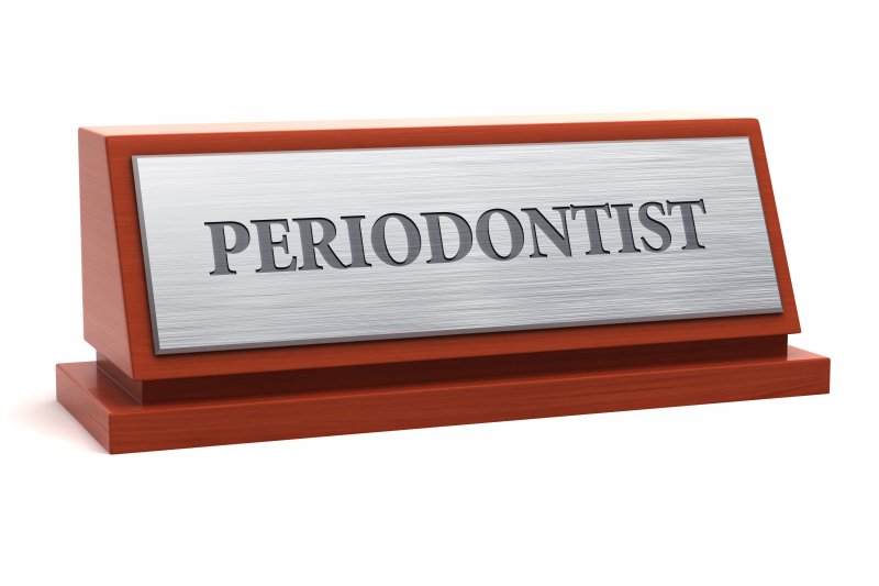 Plaque with job title for periodontist in Huntington Beach
