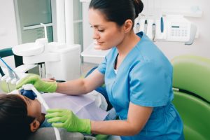 Child at the dentist’s office receiving sedation dentistry.